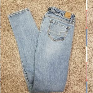 American Eagle distressed skinny lgt wash 0 reg